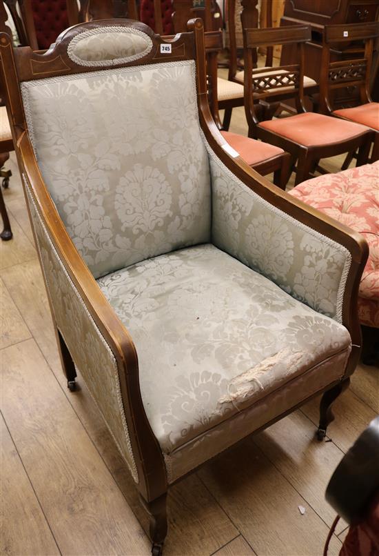 An Edwardian inlaid mahogany armchair